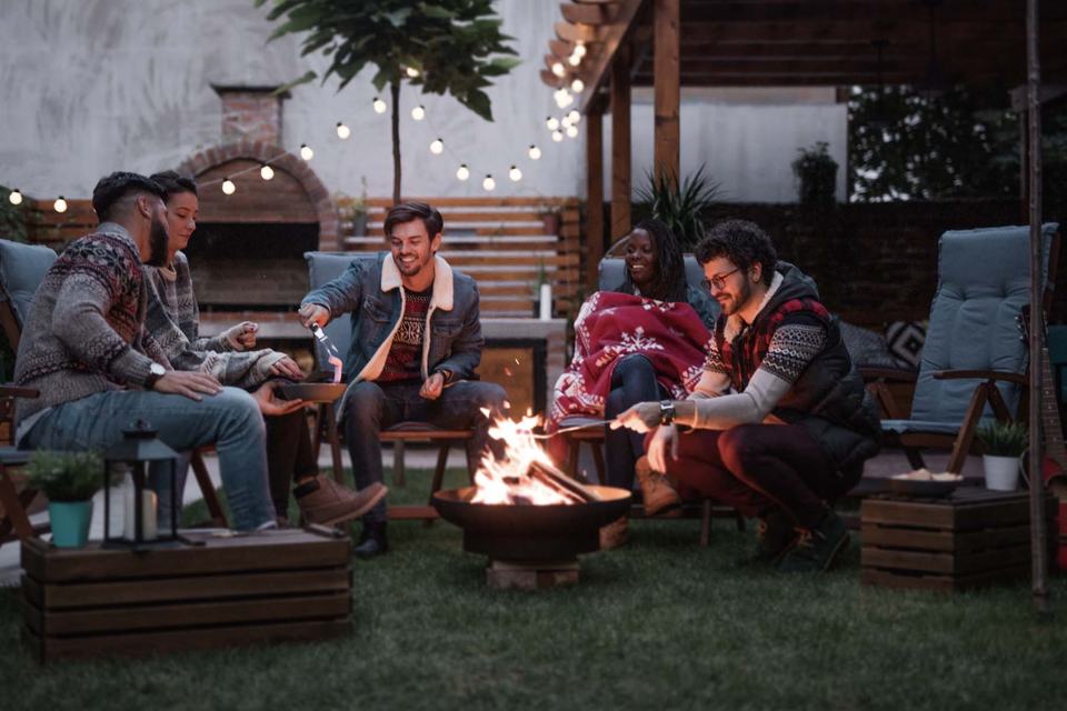 Friends-sitting-around-fire-pit