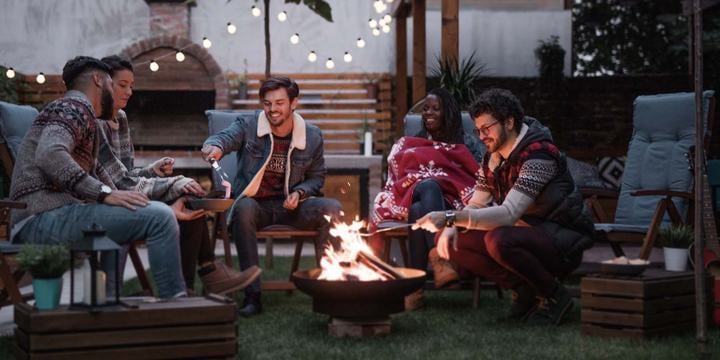 Friends-sitting-around-fire-pit