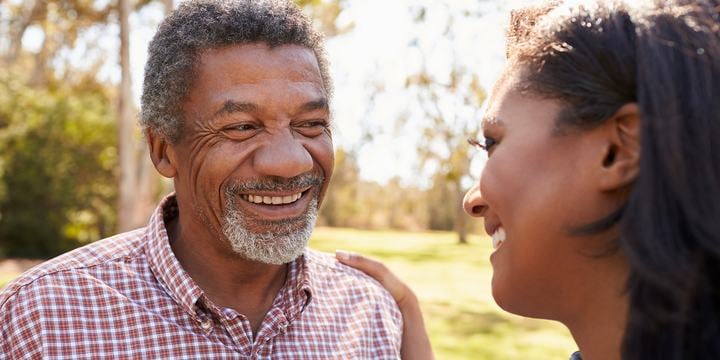 black-father-and-daughter-sharing-a-moment-smiling.jpg