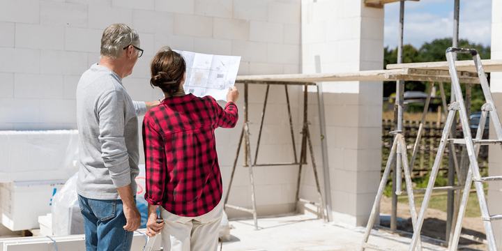 couple-on-construction-site-of-new-house.png