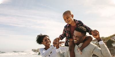 hero-black-family-walking-on-a-beach-1-1-e1593106897297.jpg
