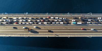 highway-with-cars-driving-traffic-over-water.jpg