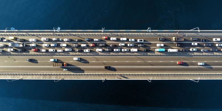 highway-with-cars-driving-traffic-over-water.jpg