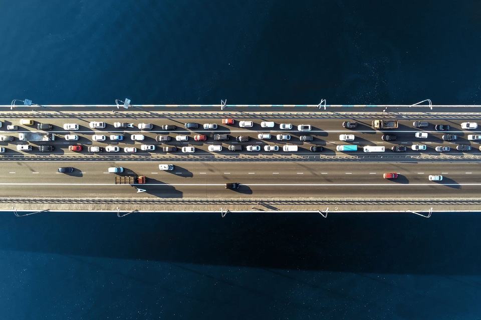 highway-with-cars-driving-traffic-over-water.jpg