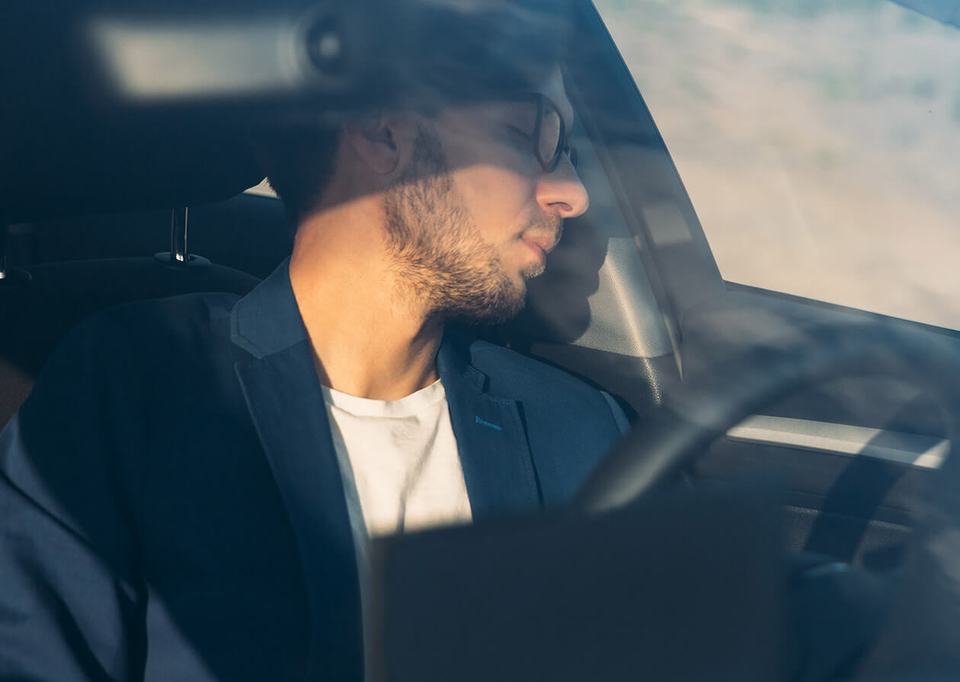 man-sleeping-in-car.jpg