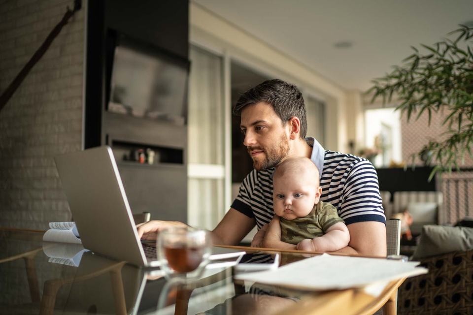 man-with-son-on-laptop-working-on-home-based-business.jpg