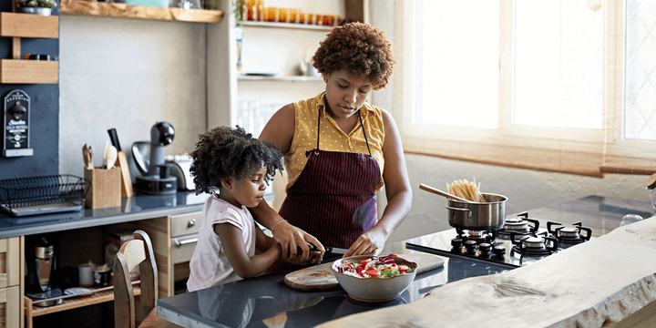 mother-and-daughter-cooking-together-in-kitchen.png