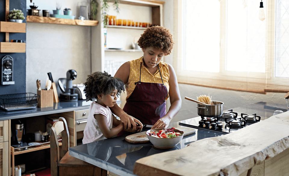 mother-and-daughter-cooking-together-in-kitchen.png
