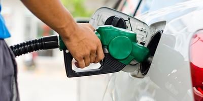 Pumping gas into a car
