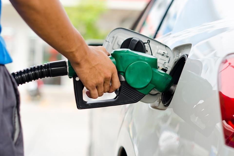 Pumping gas into a car