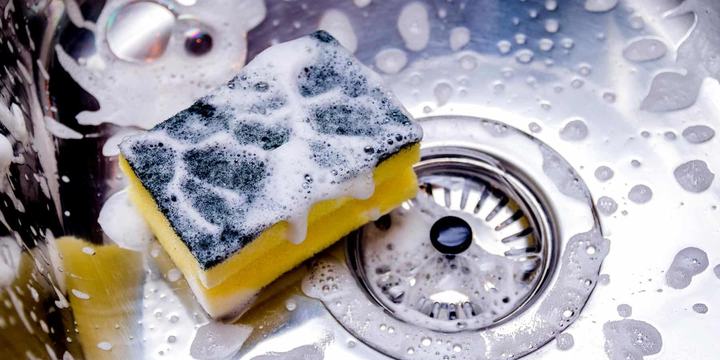 soapy-sponge-in-metal-kitchen-sink.jpg