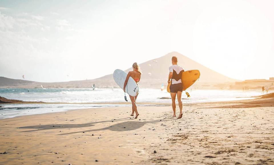  surfers-walking-towards-ocean.jpg