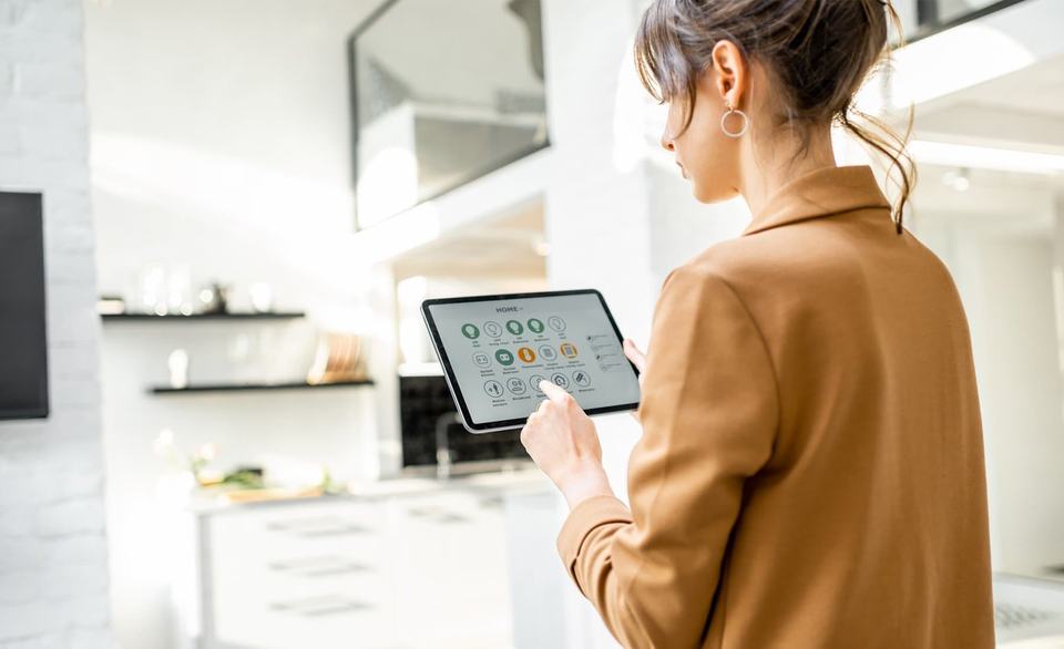 woman-using-smart-home-tablet.jpg