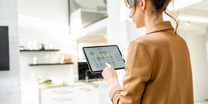 woman-using-smart-home-tablet.jpg
