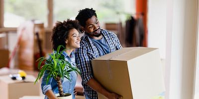young-couple-holding-moving-boxes (1).jpg